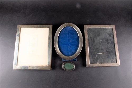Lot 347 - Four assorted silver picture frames the...