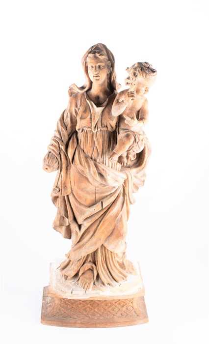 Lot 212 - A 19th century limewood carved figure of the...