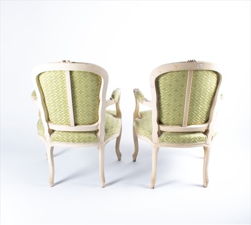 Lot 101 - A pair of Louis XV style bergere armchairs...