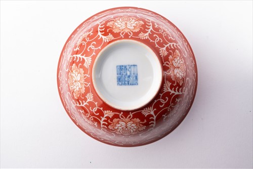 Lot 131 - A Chinese Qing dynasty coral red reverse...
