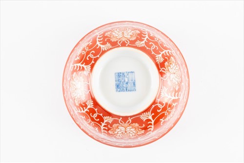 Lot 131 - A Chinese Qing dynasty coral red reverse...