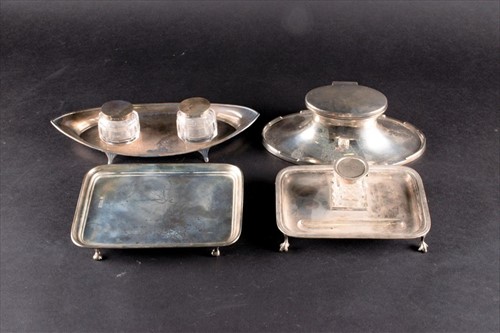 Lot 342 - A George V silver capstan inkwell of elongated...