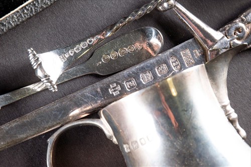 Lot 341 - A mixed group of small silver items to include...