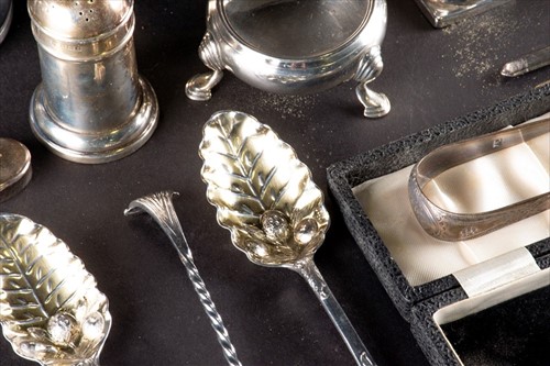 Lot 341 - A mixed group of small silver items to include...