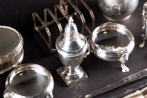Lot 341 - A mixed group of small silver items to include...