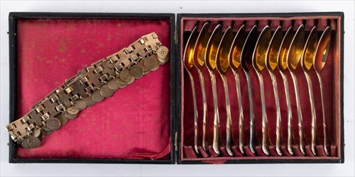 Lot 338 - A cased set of French silver gilt teaspoons...
