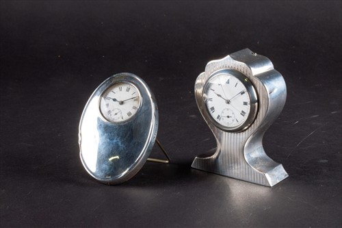 Lot 349 - An Edwardian small silver desk clock (the...