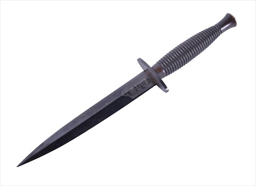 Lot 588 - A British commando dagger or fighting knife...