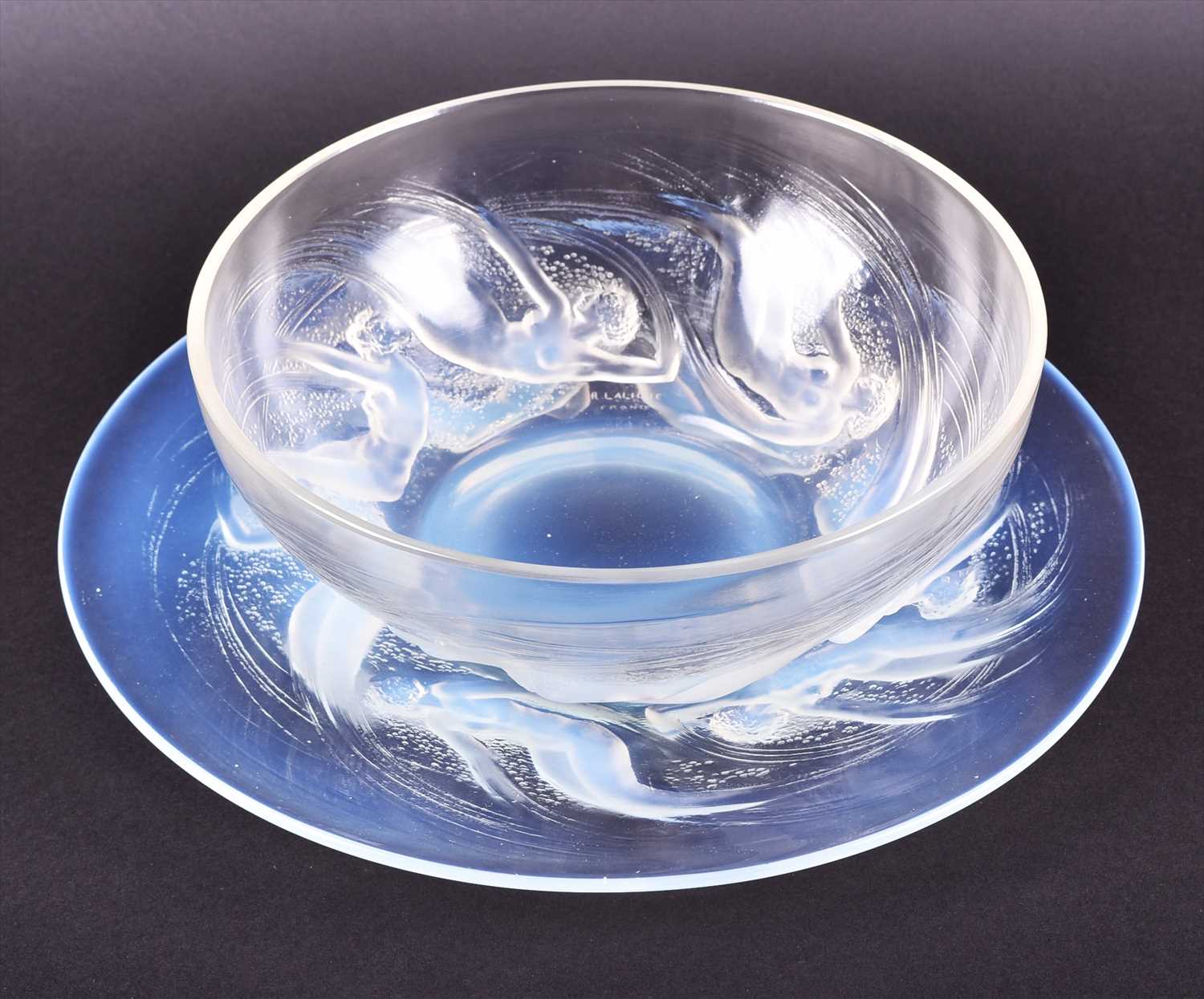 Lot 514 - A Lalique Ondines opalescent glass bowl and...