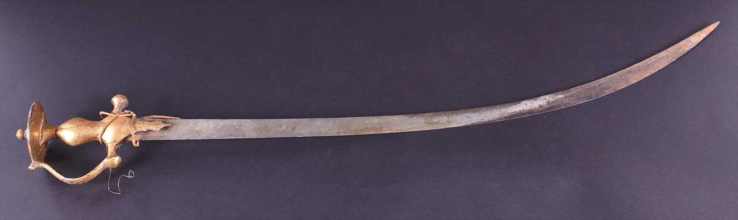 Lot 669 - A 19th century Indian talwar sword with an...