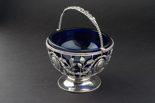 Lot 333 - A George III silver sugar basket London 1771,...