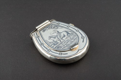 Lot 338 - A French silver and niello hunting vesta case...