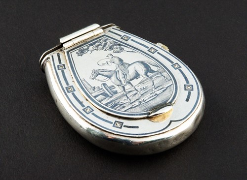 Lot 338 - A French silver and niello hunting vesta case...