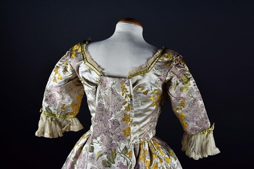 Lot 242 - A fine Victorian silk brocade ball gown...