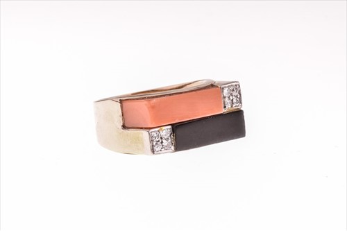 Lot 605 - A 1970s yellow metal, diamond, coral, and onyx...