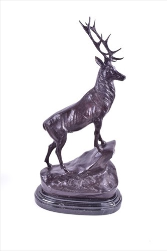 Lot 213 - A large bronze of a red royal stag modelled as...