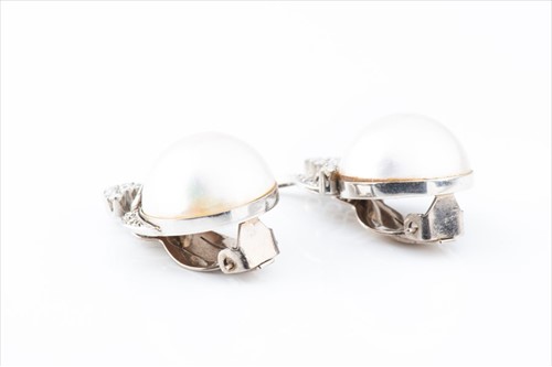 Lot 497 - A pair of mid 20th century white metal,...