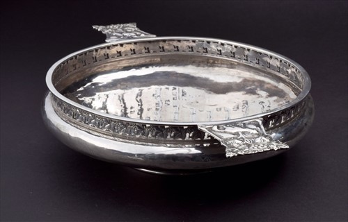 Lot 407 - An Arts and Crafts silver centrepiece bowl by...