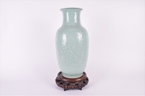 Lot 196 - A 19th century Chinese celadon vase on lotus...