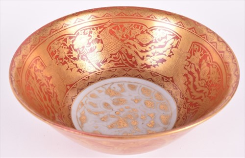 Lot 221 - A 20th century Chinese red glaze and gilt...