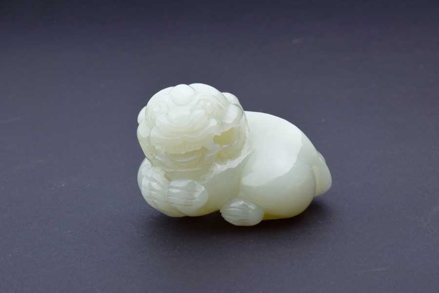 Lot 133 - A 19th century mutton jade figure of a...