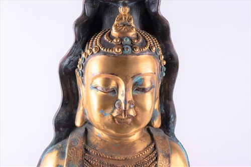 Lot 134 - A large Chinese gilt-bronze of a seated...