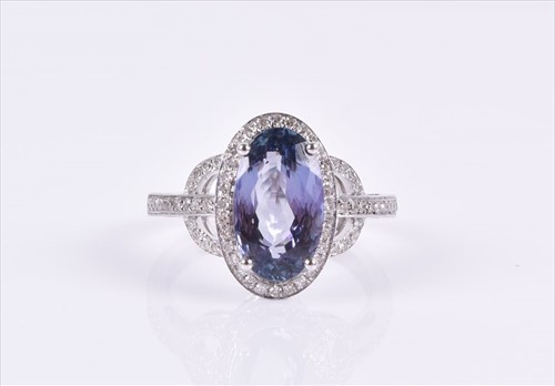 Lot 600 - A diamond and tanzanite ring the mixed...