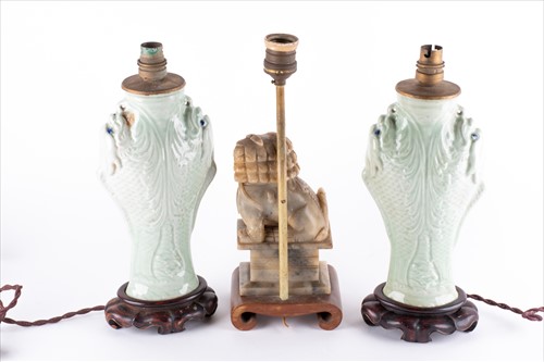 Lot 181 - A pair of Chinese celadon porcelain lamps...