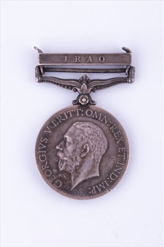 Lot 247 - A George V general service medal with Iraq...