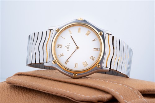 Lot 313 - An Ebel stainless steel watch the white dial...