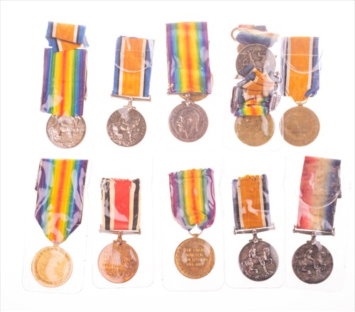 Lot 251 - A collection of six WWI medal groups largely...