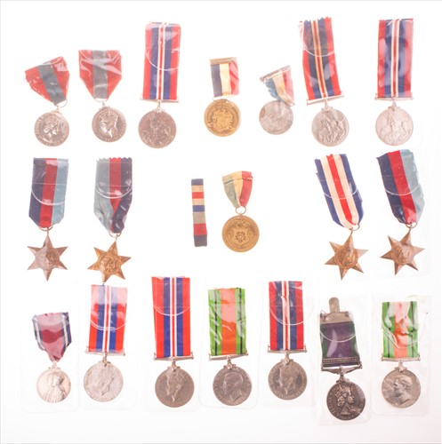 Lot 254 - A quantity of WWII and other medals comprising...