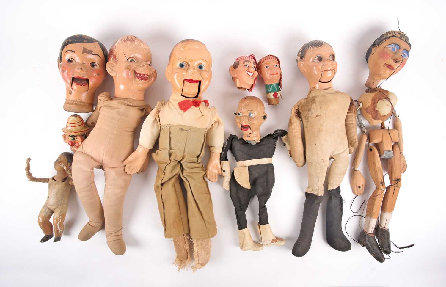 Lot 127 - A group of antique puppets, dolls, and...