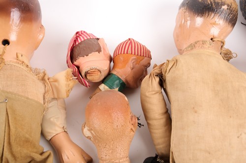 Lot 127 - A group of antique puppets, dolls, and...