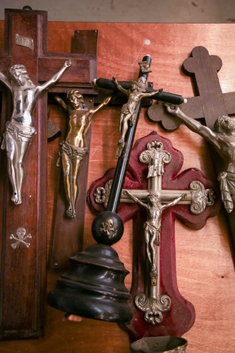Lot 101 - A collection of large antique crucifixes,...