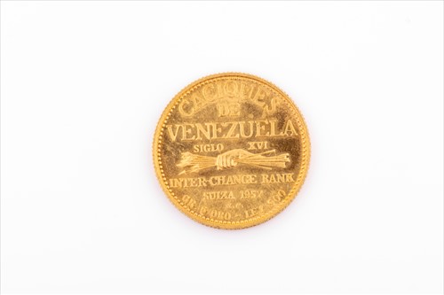 Lot 277 - A 'Caciques de Venezuela' gold coin dated 1957.