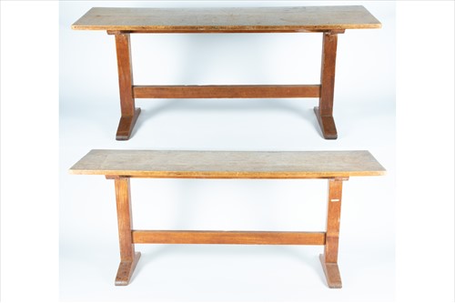 Lot 112 - A set of two Heals style oak refectory tables...