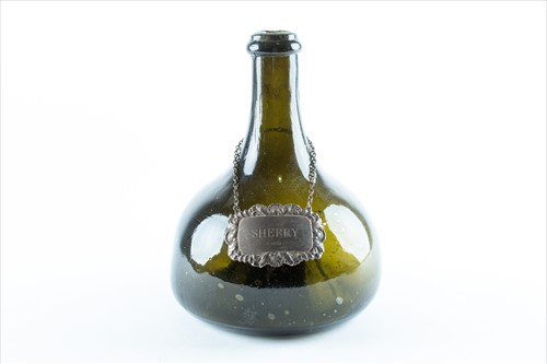 Lot 201 - An 18th century onion glass wine bottle with...