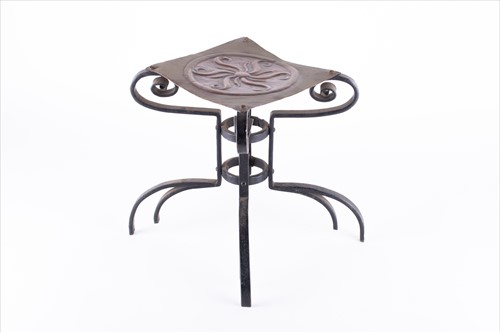 Lot 214 - An Arts & Crafts style plant stand in cast...