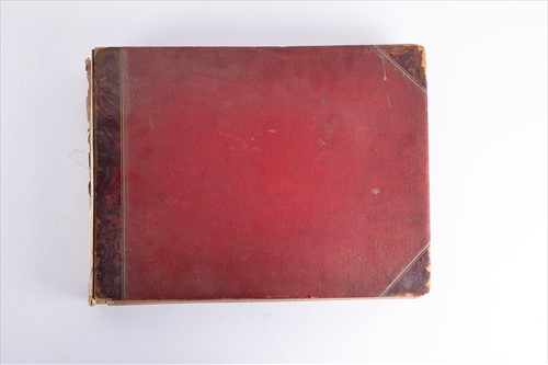 Lot 231 - An early 20th century photograph album...