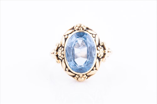 Lot 497A - A 9ct yellow gold and blue paste ring set with...