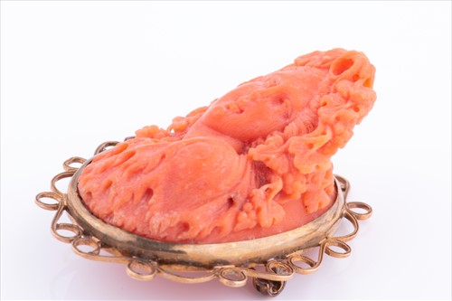 Lot 359 - A late 19th / early 20th century coral cameo...