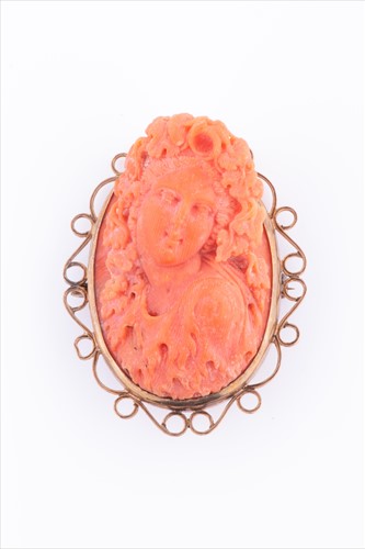 Lot 359 - A late 19th / early 20th century coral cameo...