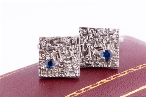 Lot 360 - A pair of 18ct white gold and sapphire...