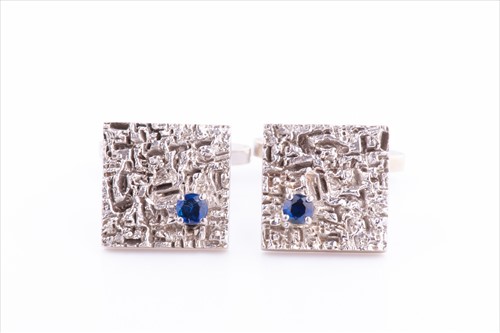 Lot 360 - A pair of 18ct white gold and sapphire...