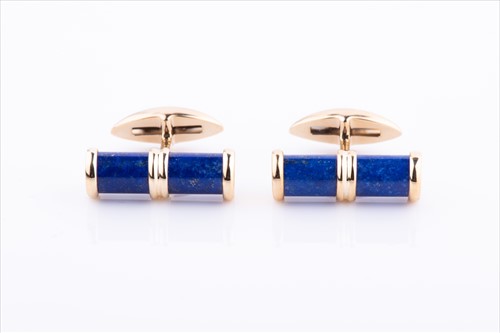 Lot 376 - A pair of 9ct yellow gold and lapis cufflinks...