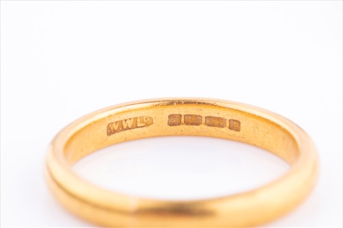 Lot 396 - Two 22ct gold wedding bands 8 grams, together...