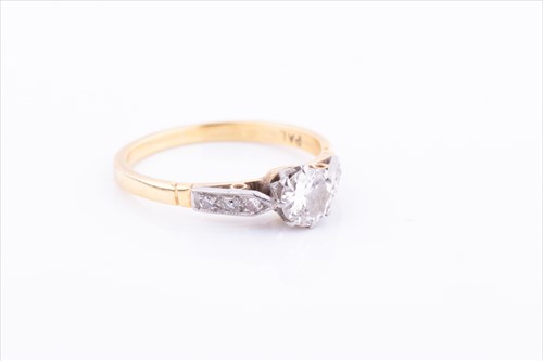 Lot 398 - A yellow metal and solitaire diamond ring set...