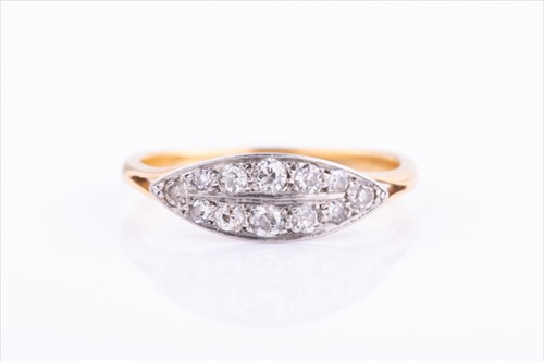 Lot 908 - An 18ct yellow gold and diamond ring the...