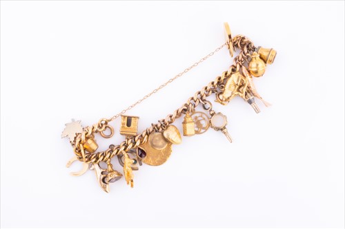 Lot 375 - A 9ct yellow gold curb-link charm bracelet...